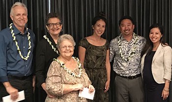 JA President Janel Denny (center) and Board Member Emi Au (far right) congratulate Anthology's partners